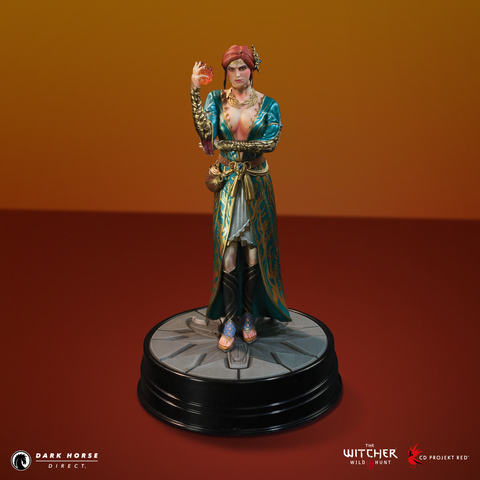 Triss standing sternly with left arm across abdomen and right arm bent up at the elbow. She has the beginnings of magic in her right hand and is in her exclusive DLC outfit.
